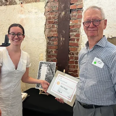 Amelia Irausquin, winner of the 2025 Student Printmaker Award, receiving her award.