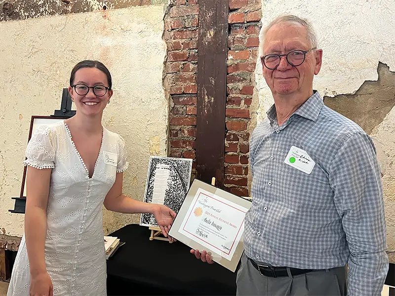 Amelia Irausquin, winner of the 2025 Student Printmaker Award, receiving her award.